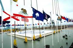 the-us-flag-and-state-flags-line-the-edge-of-the-first-part-of-the-ship-during-c0d8ec-1600.jpg